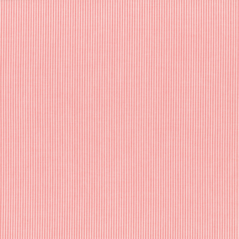Pink and white striped fabric featuring narrow stripes