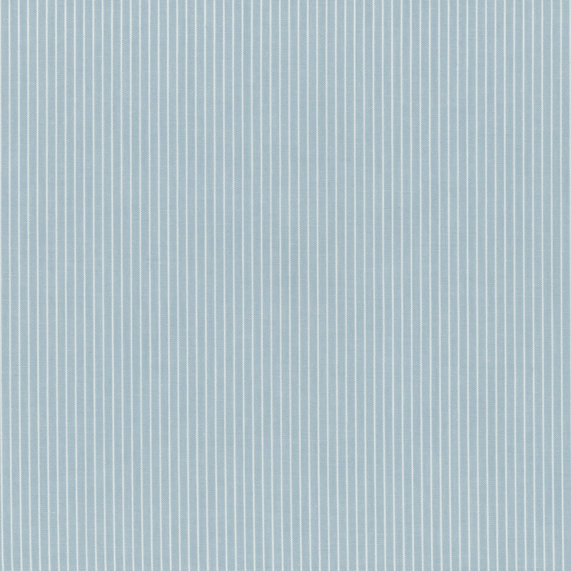 Blue and white striped fabric featuring narrow stripes