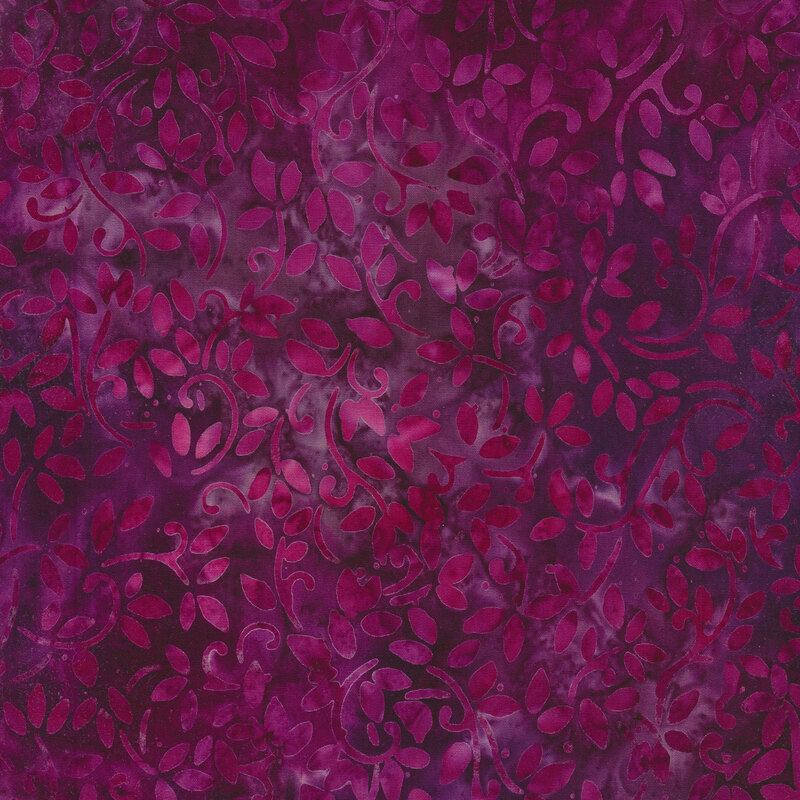 Mottled purple fabric with a pattern of swirling mottled magenta vines.