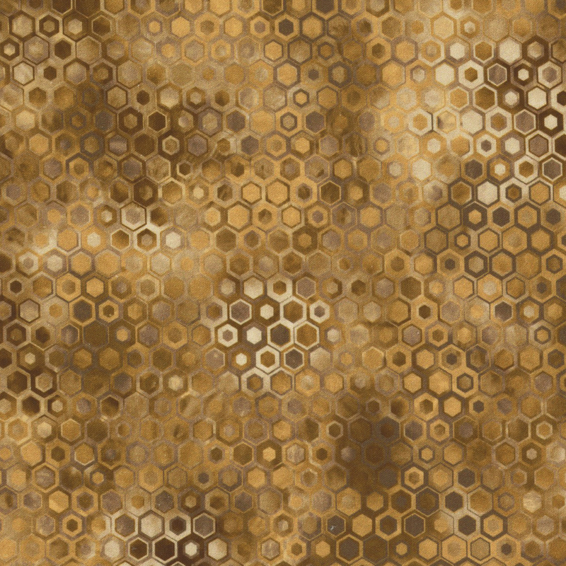 beautifully mottled geometric fabric featuring a honeycomb pattern filled with nestled hexagons in varied shades of brown, tan, and cream