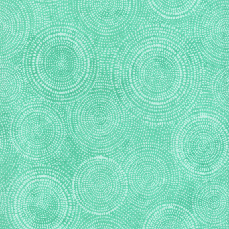 Photo of turquoise mottled fabric with pale tonal rings made up of tiny dashes