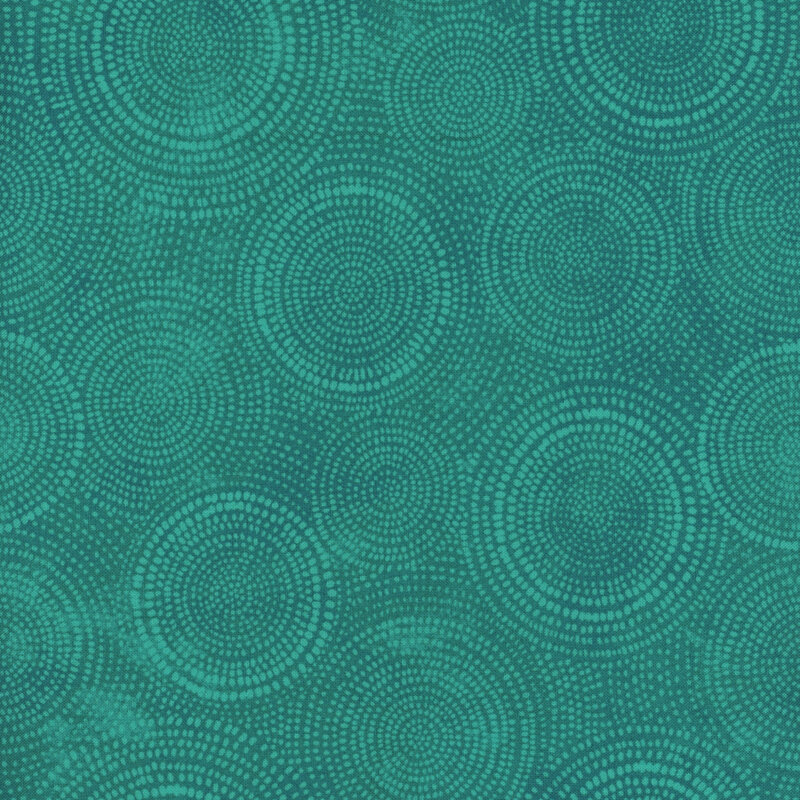 Photo of dark teal mottled fabric with pale tonal rings made up of tiny dashes