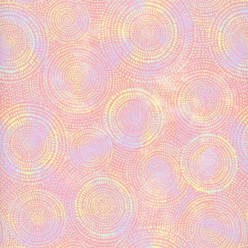 Photo of light pink rainbow mottled fabric with lighter tonal rings made up of tiny dashes