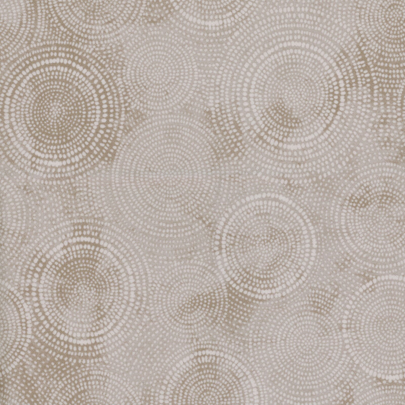 Photo of gray fabric with lighter tonal rings made up of tiny dashes