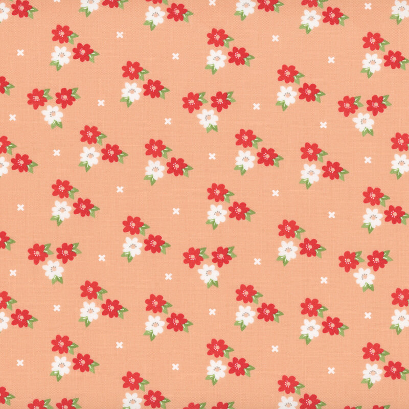 peach fabric featuring clusters of flowers
