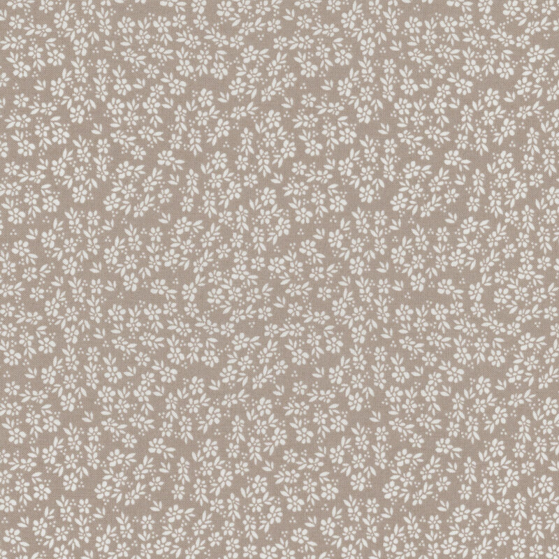 gray fabric featuring packed white flowers