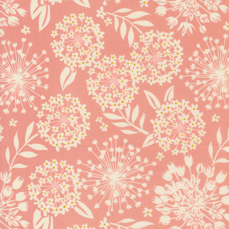 An image of a pink colored fabric with cream colored silhouettes of flowers and leaves.