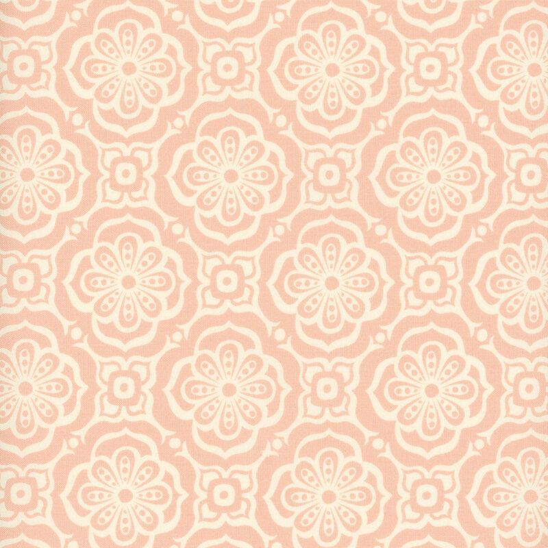 A pink colored fabric with a cream colored floral tile pattern.