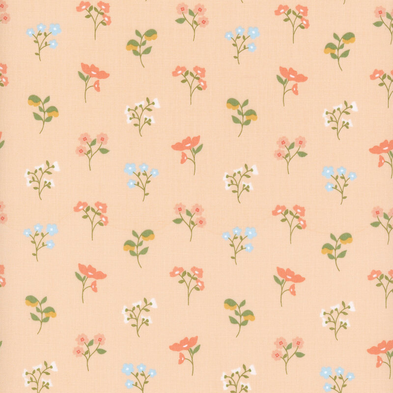 Pink fabric with a pattern of floral sprigs in pink, blue, and yellow.