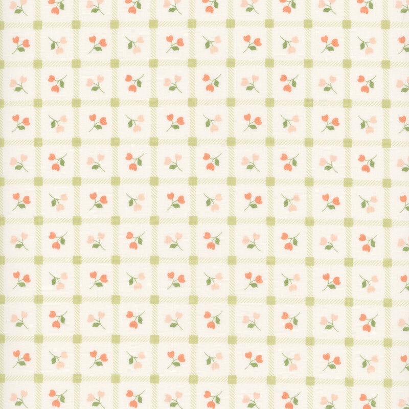 Off-white fabric with a pattern of pink floral sprigs in a green grid.