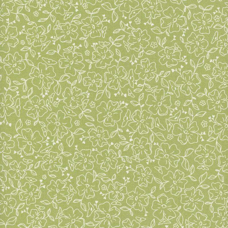 Green fabric with a pattern of white lined flowers and leaves.