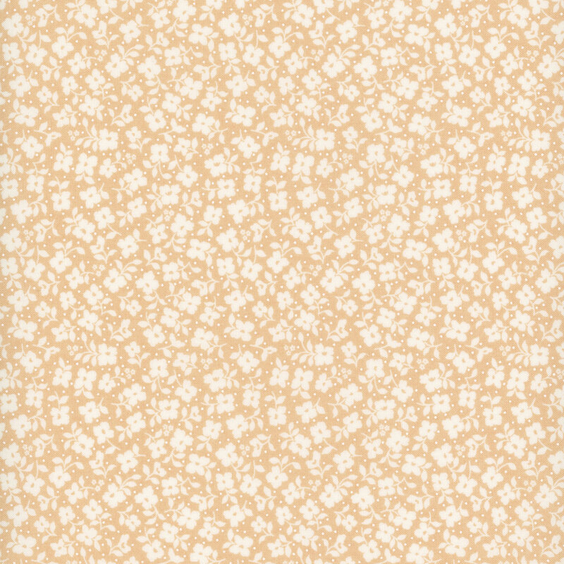 Tan fabric with a packed pattern of white flowers and leaves.