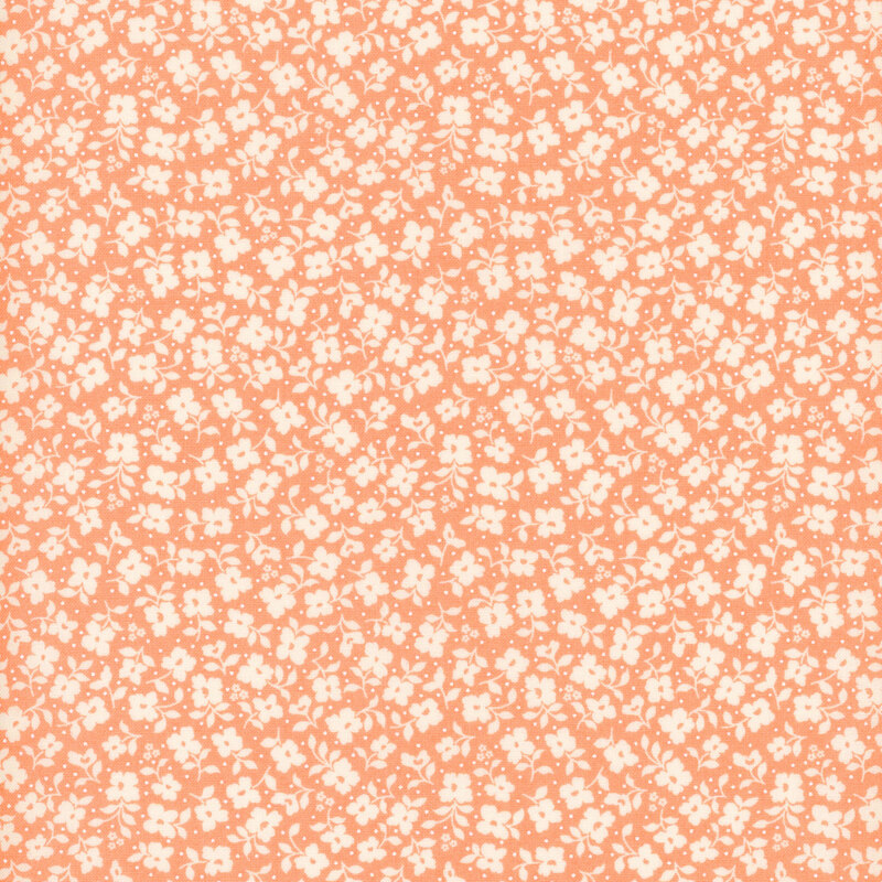 Coral fabric with a packed pattern of white flowers and leaves.