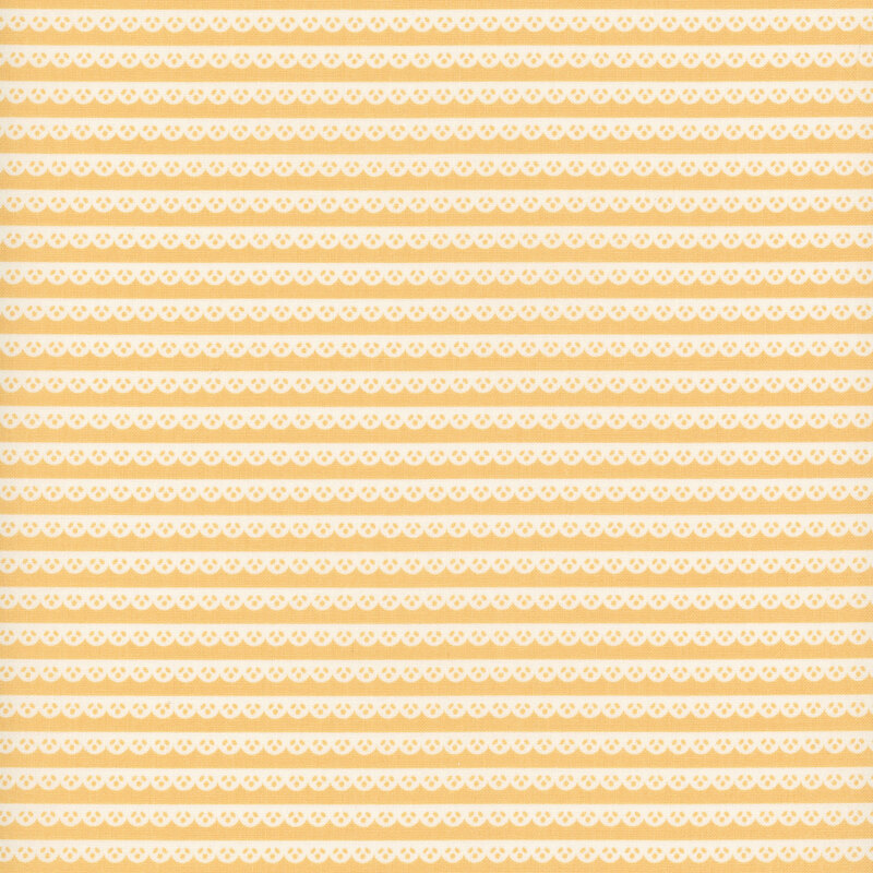 Yellow fabric with a pattern of white scallop lace stripes.