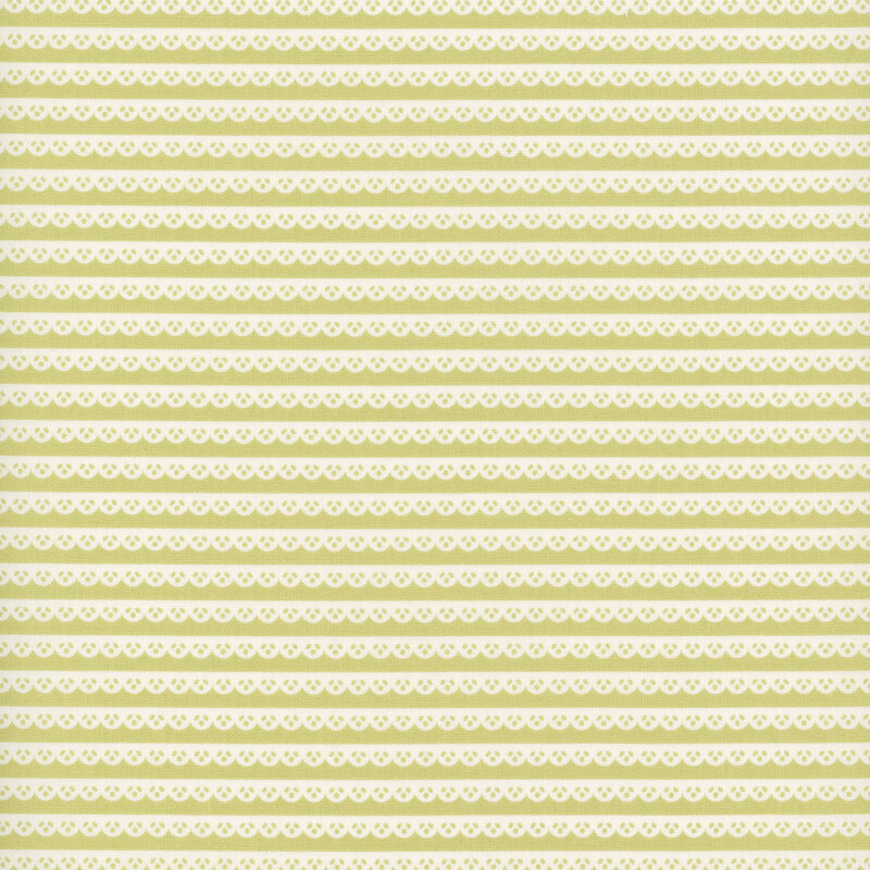 Green fabric with a pattern of white scallop lace stripes.