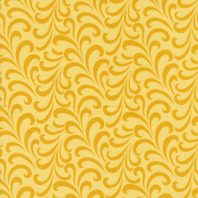 Yellow fabric with an abstract pattern of mustard yellow swirls.