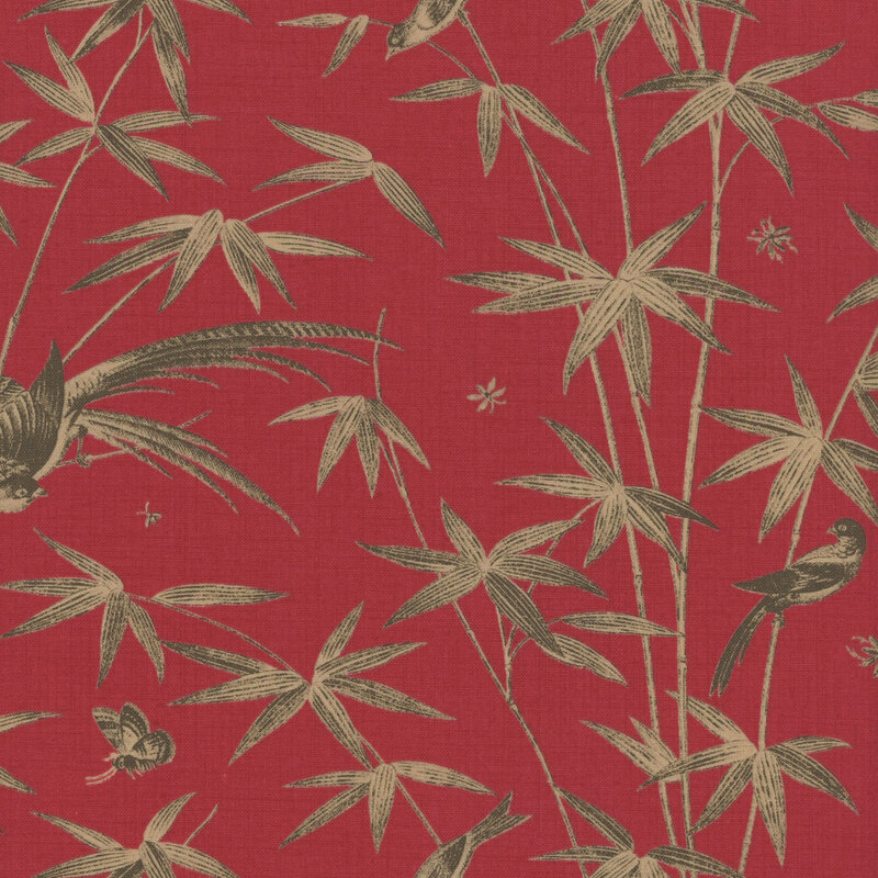 Red fabric featuring brown colored birds and bamboo shoots