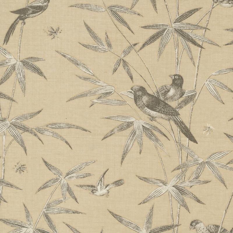 dark cream fabric featuring black and white colored birds and bamboo shoots