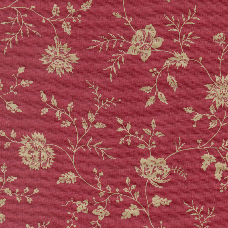 Red fabric featuring vines of gray flowers