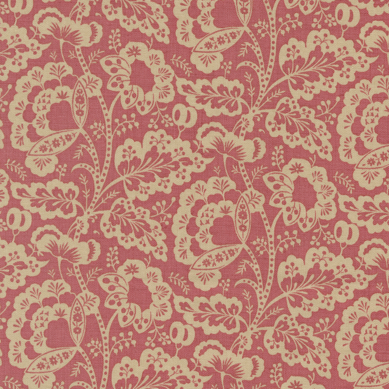 pink fabric featuring a intricate floral design