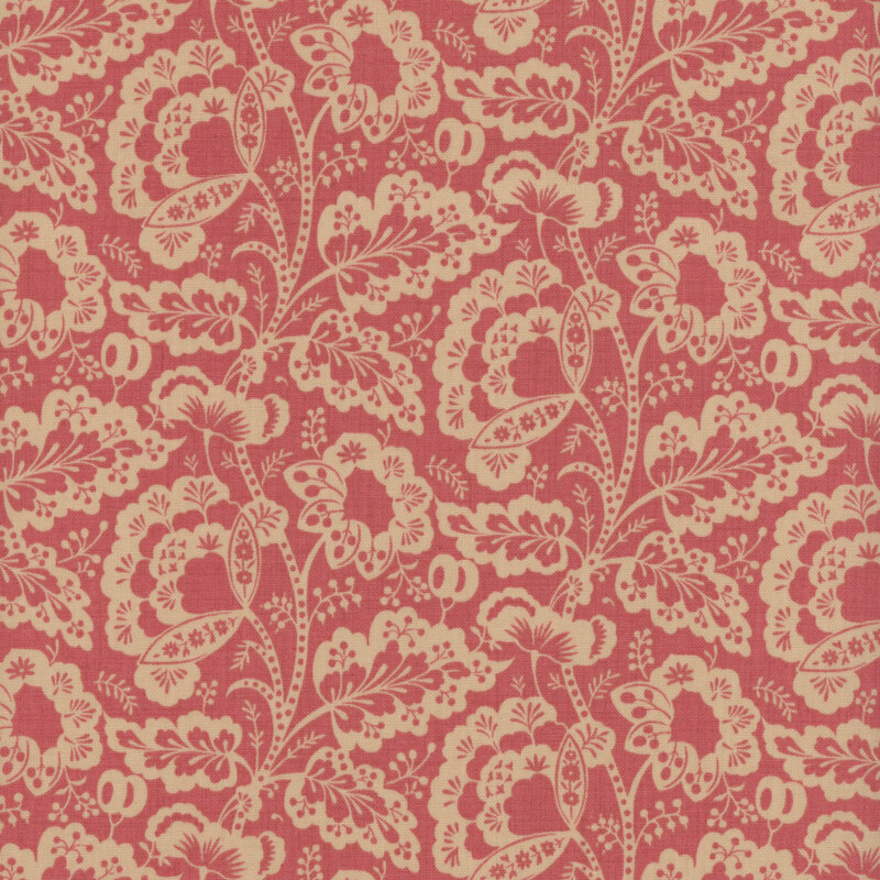 pink fabric featuring a intricate floral design