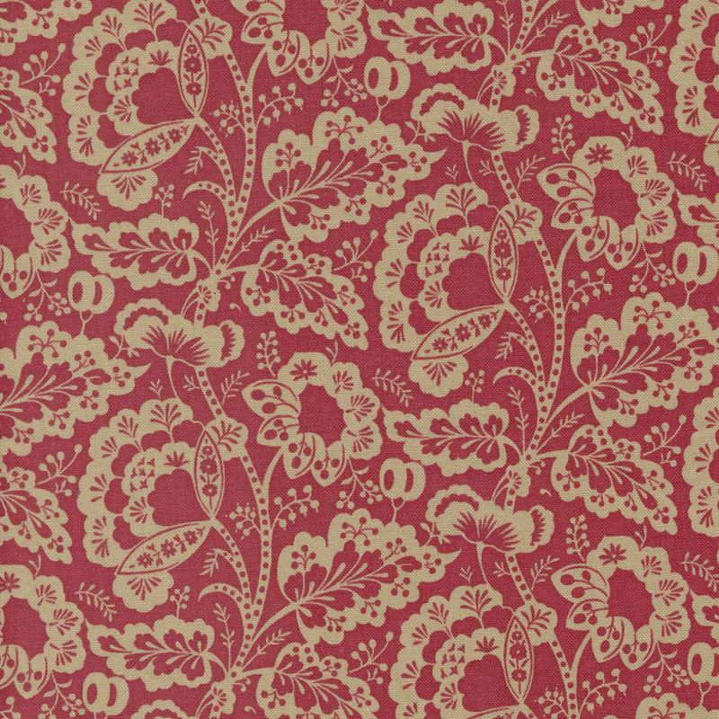 red fabric featuring a intricate floral design