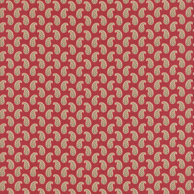 red fabric featuring cream paisleys