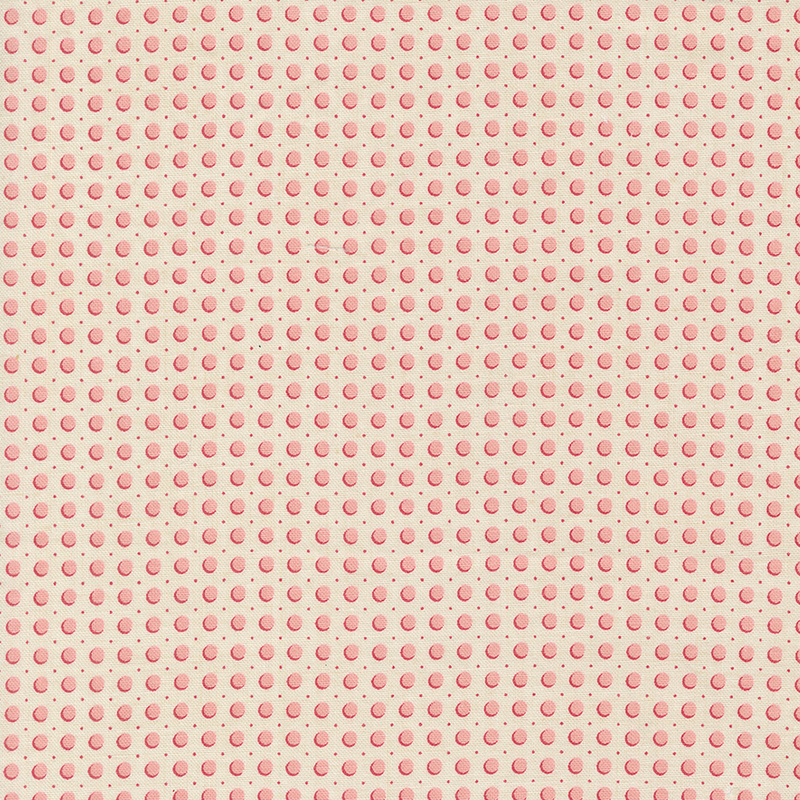 Cream fabric featuring pink dots