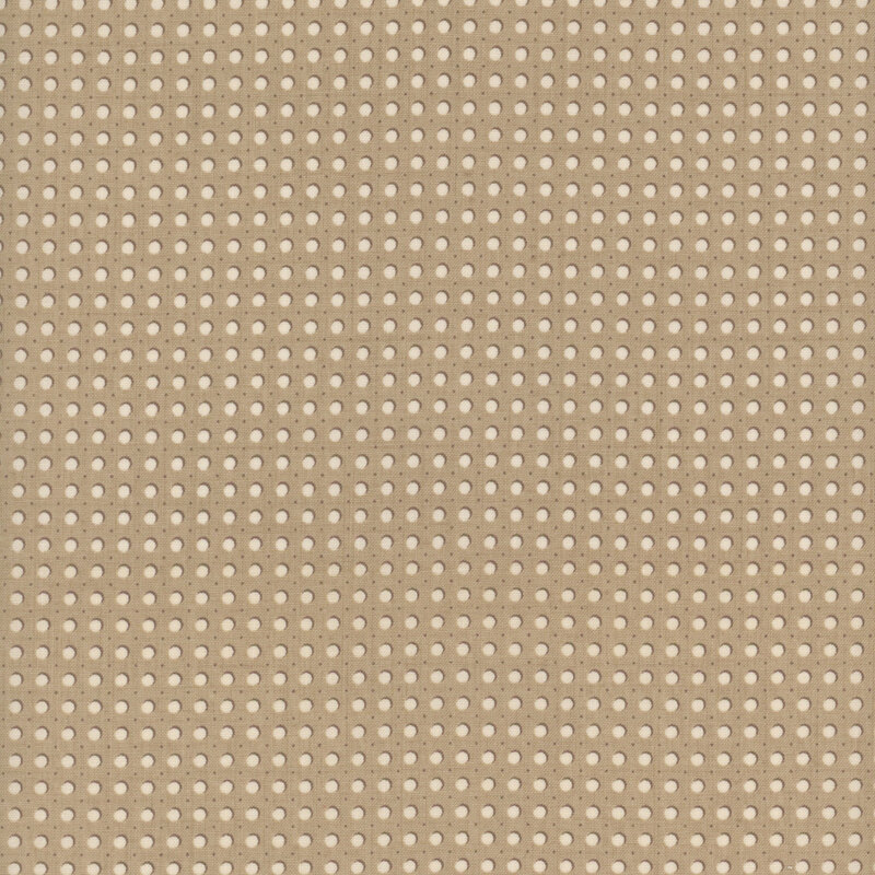 gray fabric featuring cream dots