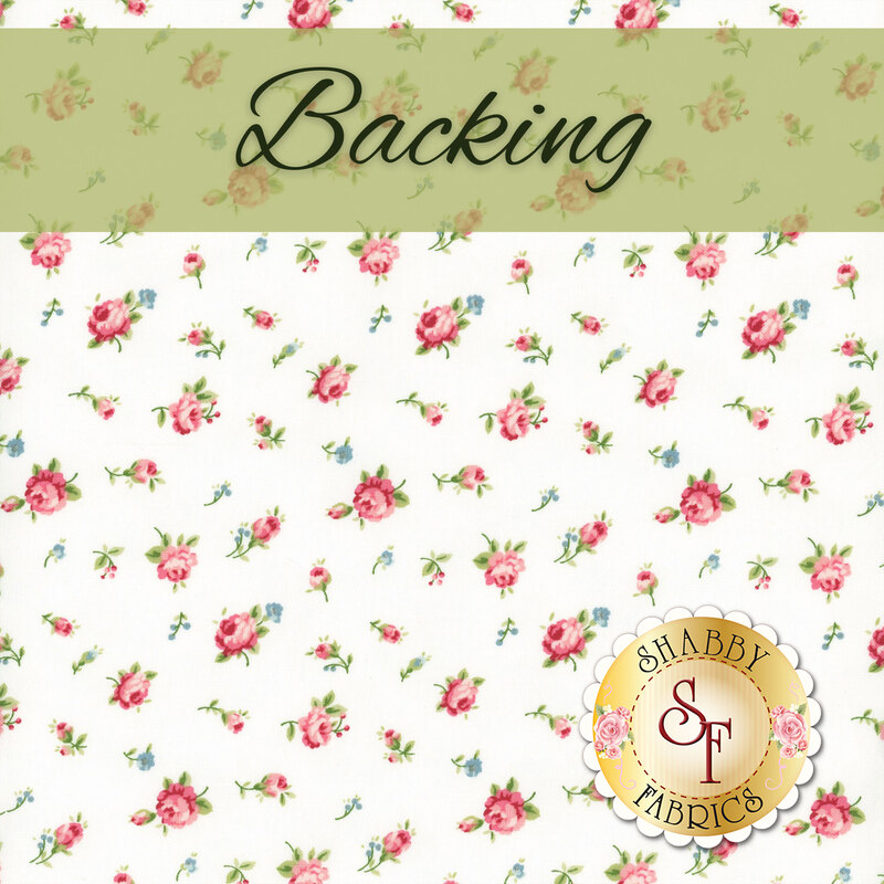 A white fabric with tossed and ditsy rose blooms. A green banner at the top reads 