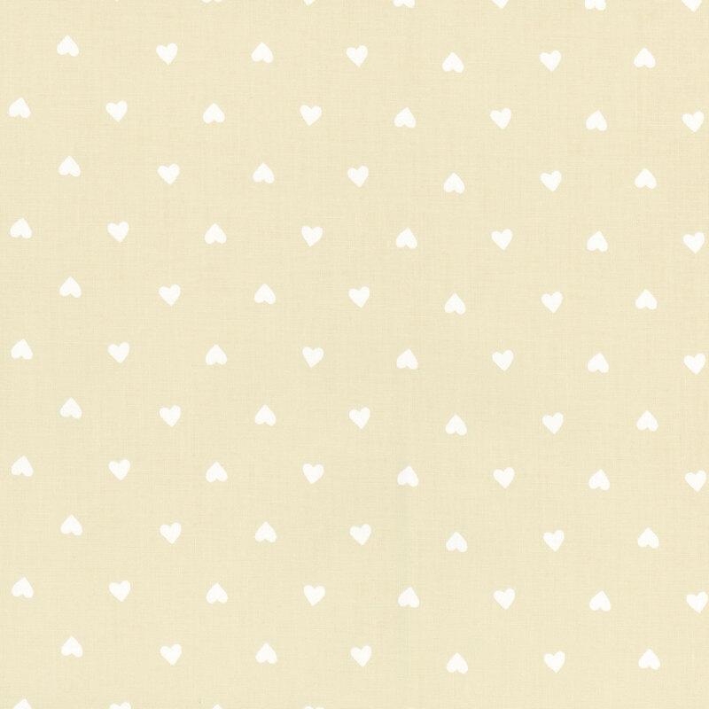 Eggshell-colored fabric with small with evenly spaced small white hearts