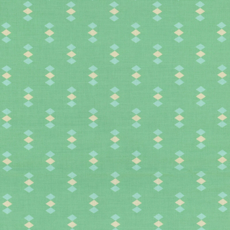 Mint green fabric featuring evenly spaced clusters of light blue and white diamonds throughout