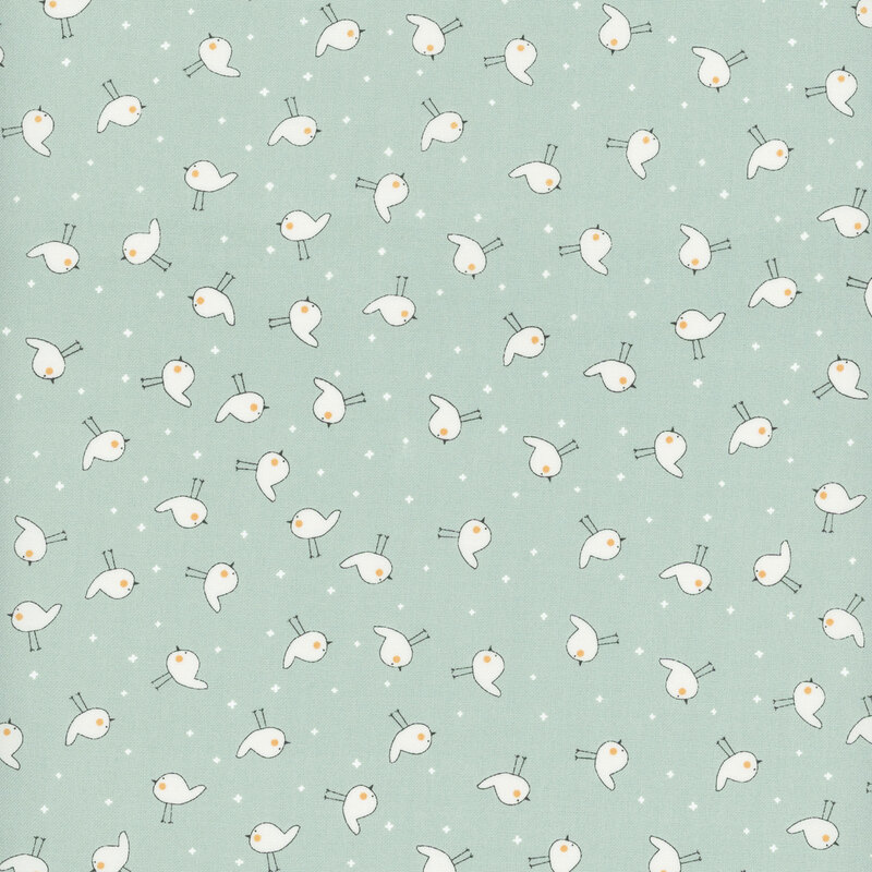 Sky blue fabric with white ditsy birds and tiny plus signs all over