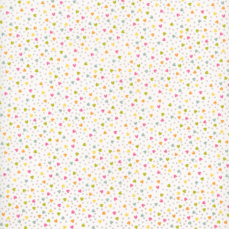 White fabric with various colored tiny hearts and small gray dots scattered throughout