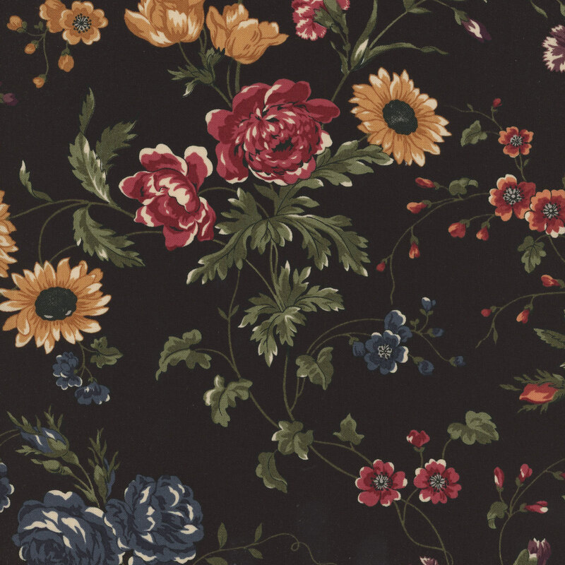 Black fabric with red, yellow, and orange florals and swirling green vines throughout