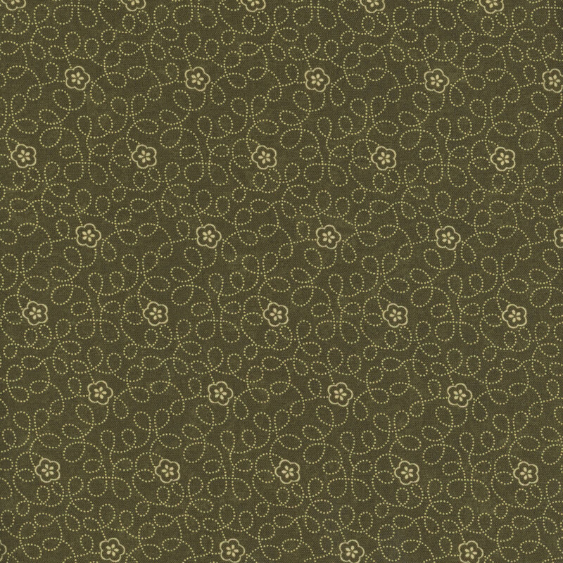 Saturated forest green fabric with small, white, dotted swirling vines and flowers throughout