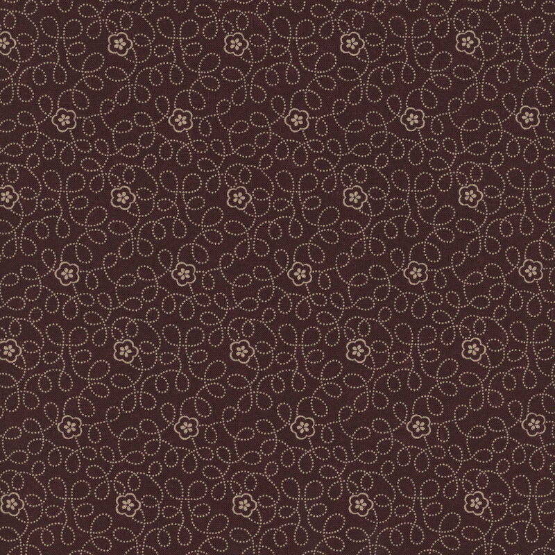 Brown fabric with small, white, dotted swirling vines and flowers throughout