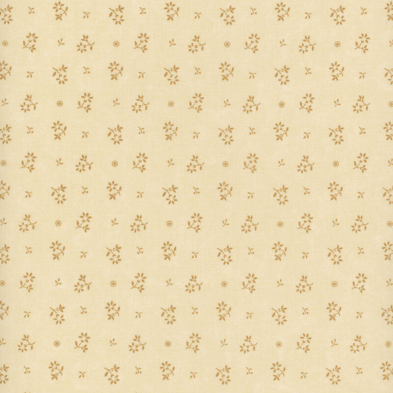 Cream-colored fabric with tan leaflets and dots.