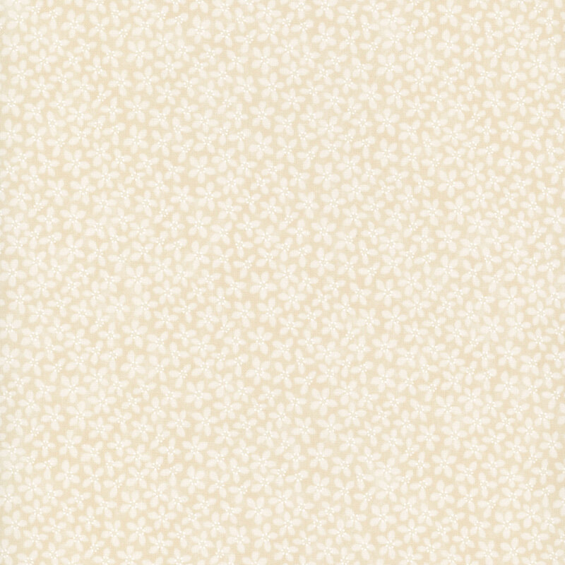 Cream-colored fabric with a pattern of packed white flowers.