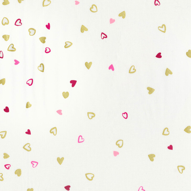 Off white fabric with small metallic and pink hearts in an ombre pattern