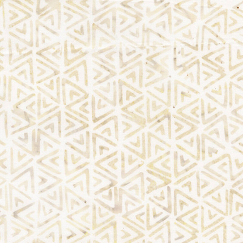 White fabric with a cream and beige mottled tribal print.