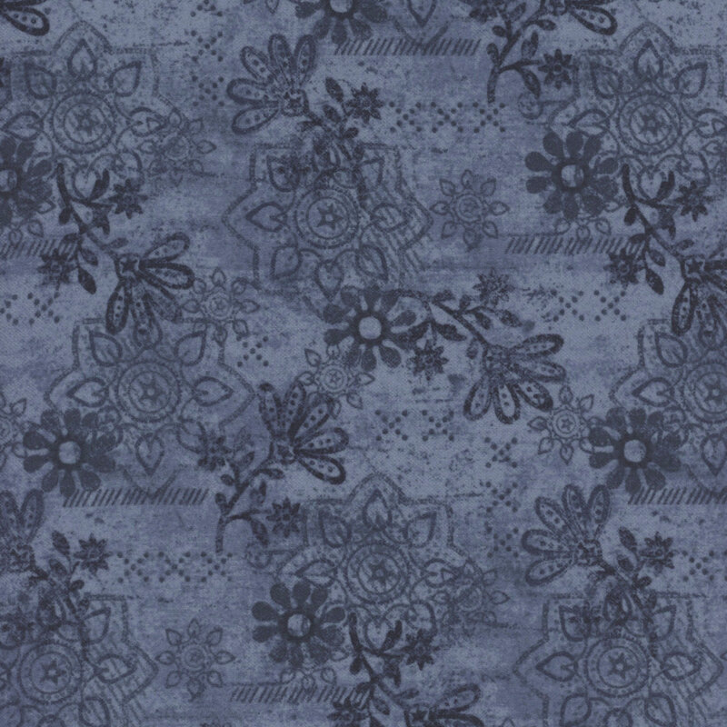 Blue fabric featuring a lovely design of floral elements