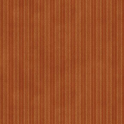 Burnt orange fabric featuring a dotted striped design