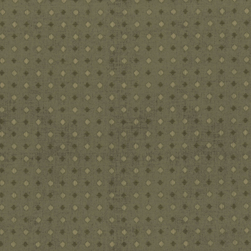 green fabric featuring a diamond shaped polka dot pattern