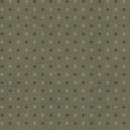 green fabric featuring a diamond shaped polka dot pattern