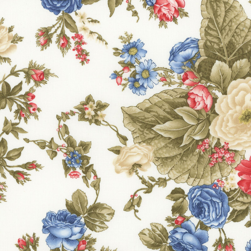 A section of a cream fabric with large pink, cream and blue florals with large green leaves