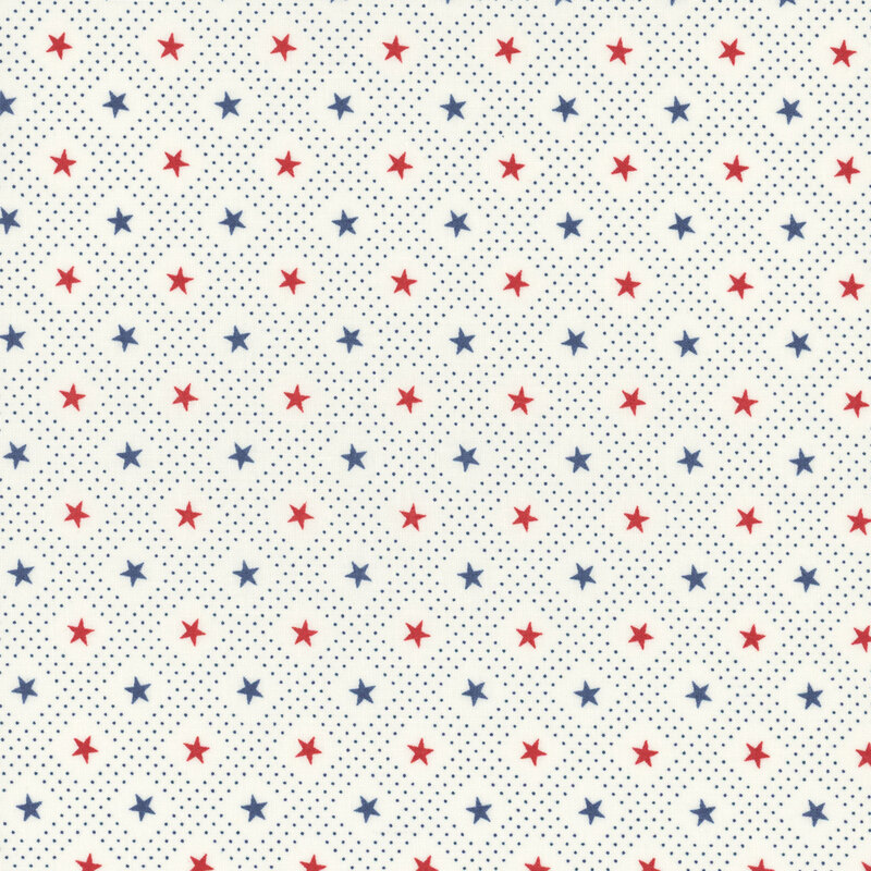 Section of a cream fabric with patterned red and blue stars.