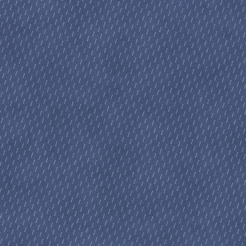 Section of a dark blue fabric with small lighter diagonal lines.