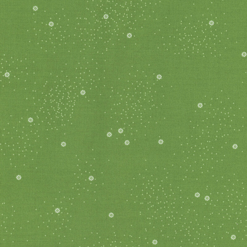 A deep green fabric with small white daisies and little white speckles throughout
