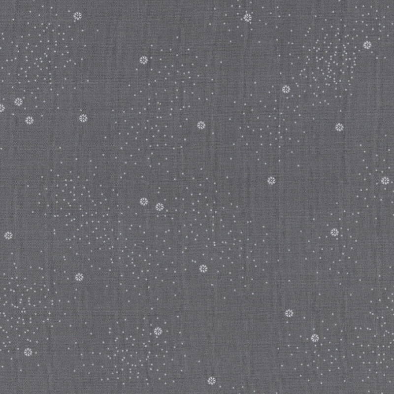 A dark gray fabric with small white daisies and little white speckles throughout